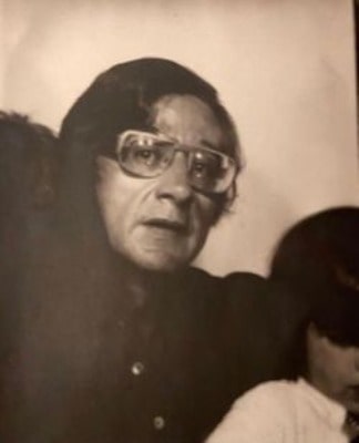 Elliot Beitner posing for a photoshoot by wearing black outfit.